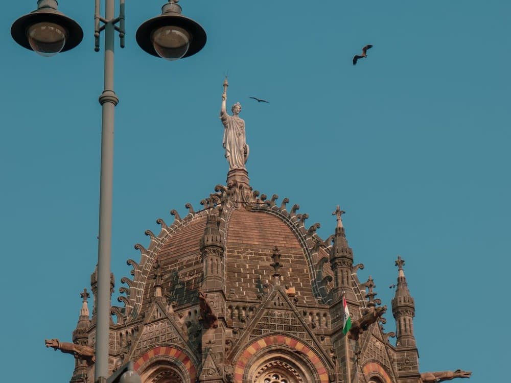 Chhatrapati Shivaji Maharaj Terminus (CSMT) Gothic dome and statue, Mumbai