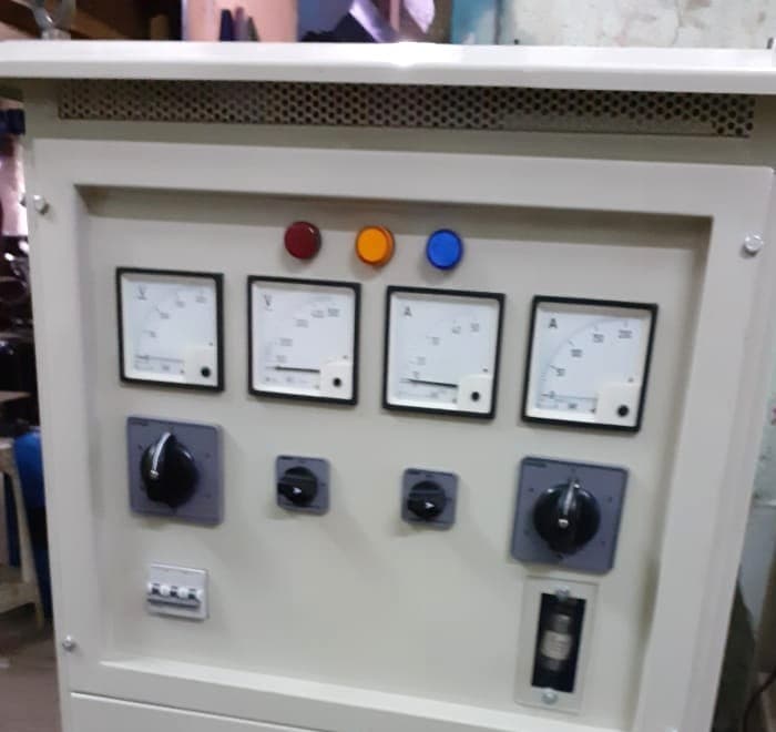 Control panel with analog meters, indicator lights and rotary switches on an Equipment Controls Company cabinet